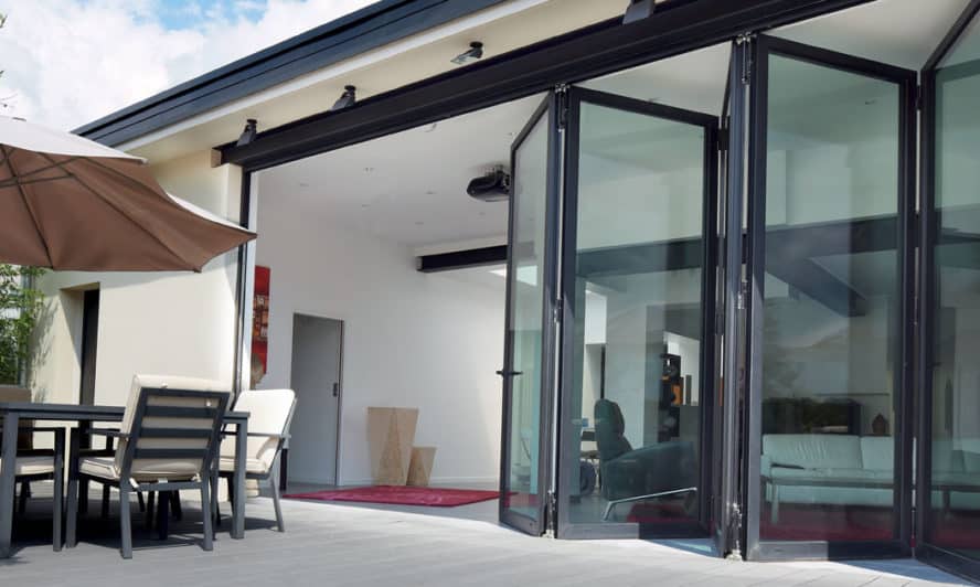 Folding patio doors turn a courtyard into outdoor living space