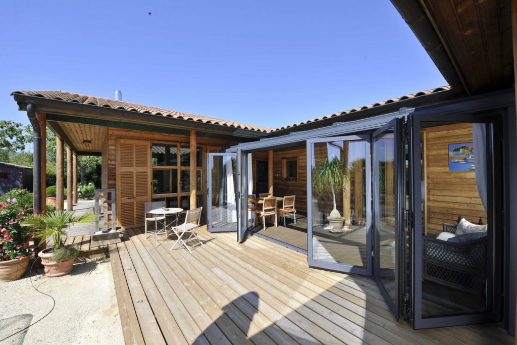 Folding patio doors can embed your self-build home into the landscape